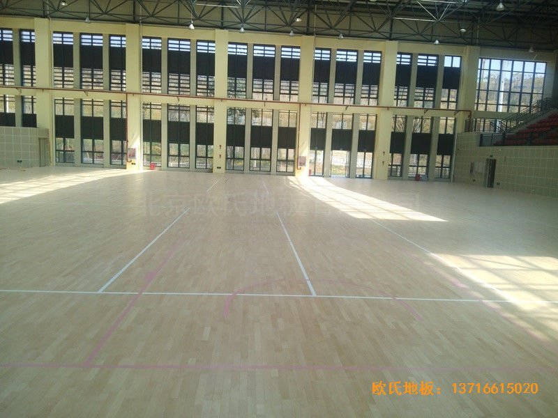 云南滇西技術(shù)大學總部籃球館體育木地板施工案例4